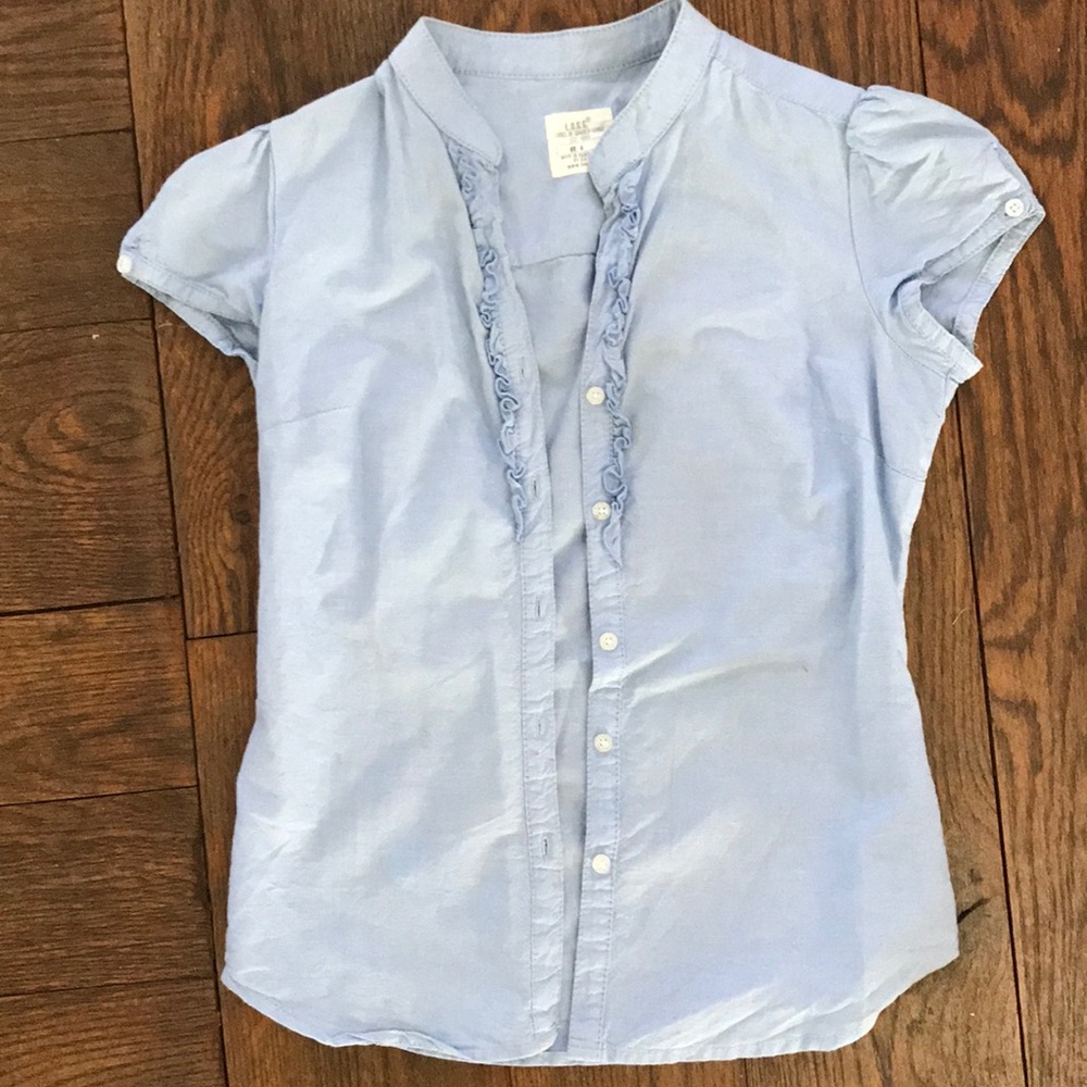Blue short sleeved button down shirt